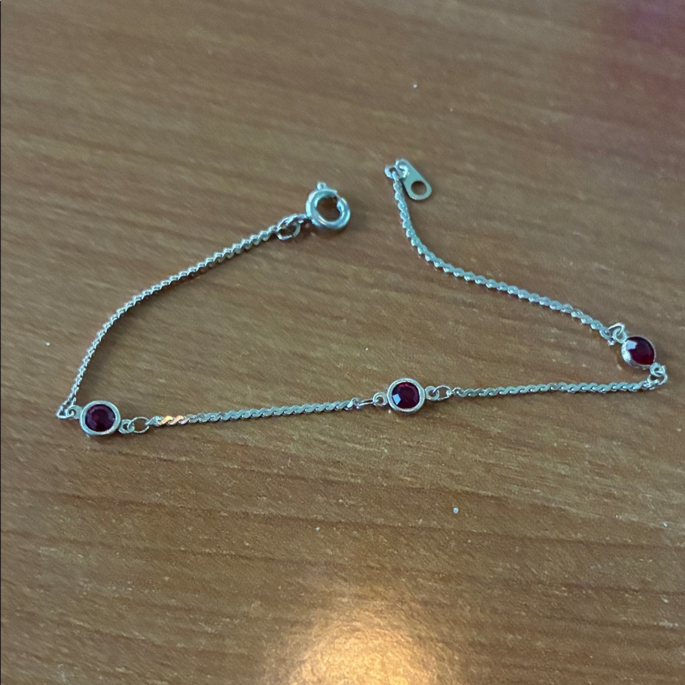 Elegant Silver Bracelet with Red Accents